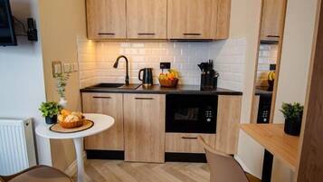 Standard Double Room | Private kitchen | Fridge, microwave