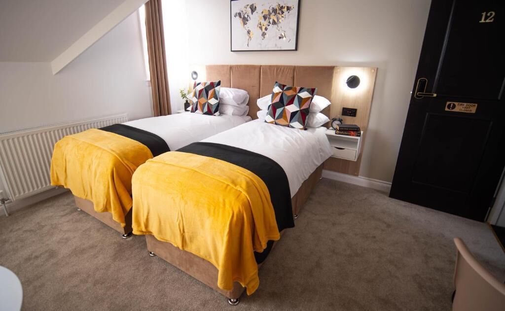 Standard Double or Twin Room | Desk, laptop workspace, blackout drapes, iron/ironing board