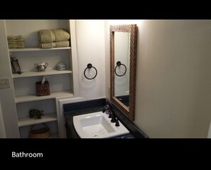Hair dryer, towels, soap, toilet paper