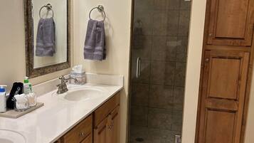 Shower, hair dryer, towels, soap