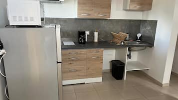 Departamento Confort, vista al mar | Área de sala de estar