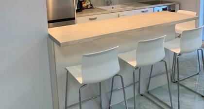 Modern family-sized condo near the beach