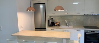 Modern family-sized condo near the beach