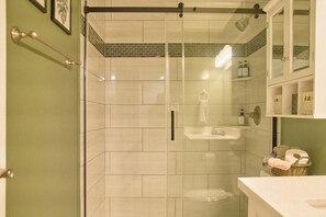 Shower, hair dryer, towels, soap