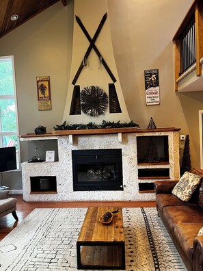 Smart TV, fireplace, foosball