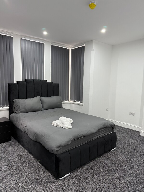 2 dormitorios, tabla de planchar con plancha, wifi gratis y ropa de cama