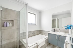 Shower, hair dryer, towels, soap