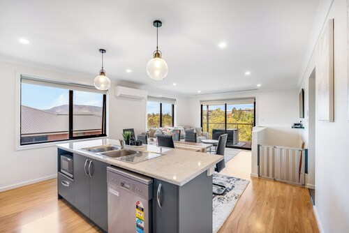 Stylish 4BR Family Escape - Deck & Views Near MONA