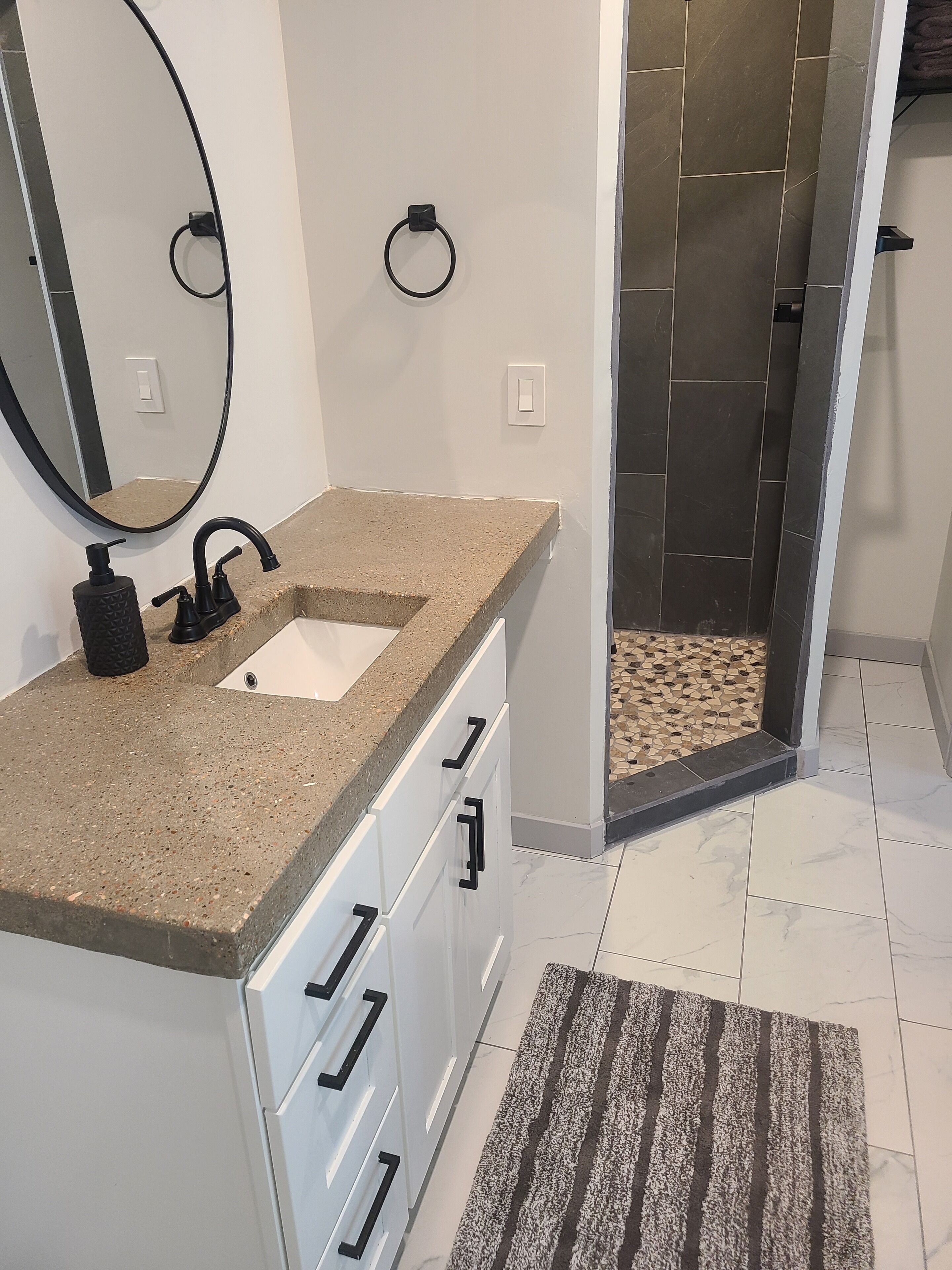Shower, towels, soap, toilet paper