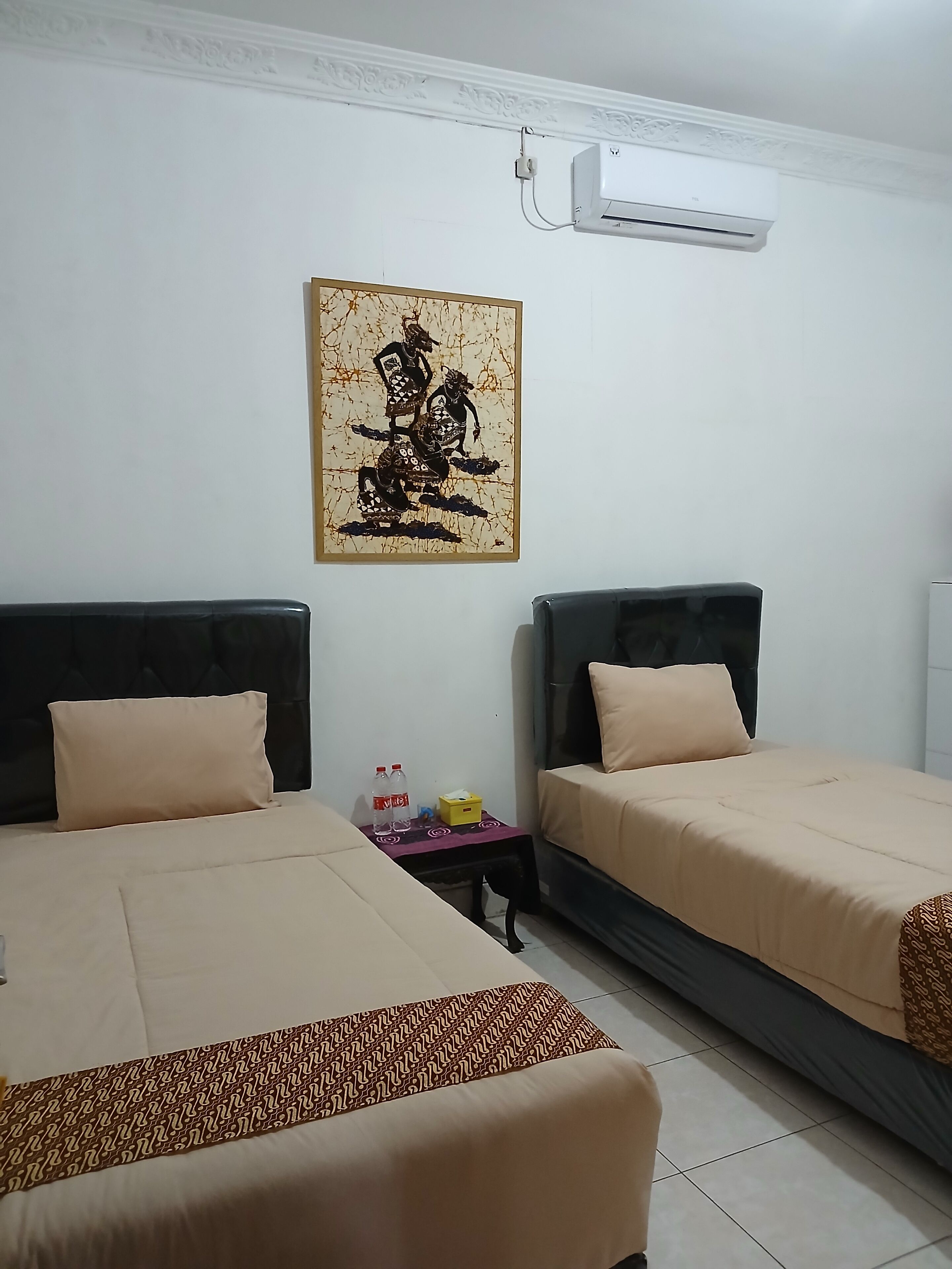 Desk, laptop workspace, bed sheets