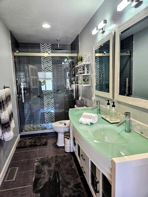 Shower, hair dryer, towels, soap