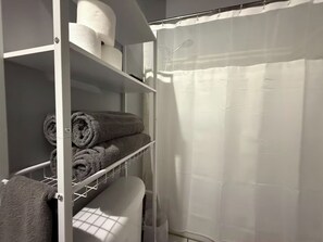 Hair dryer, towels, soap, toilet paper