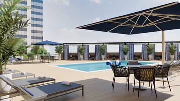 Outdoor pool, free cabanas, pool umbrellas