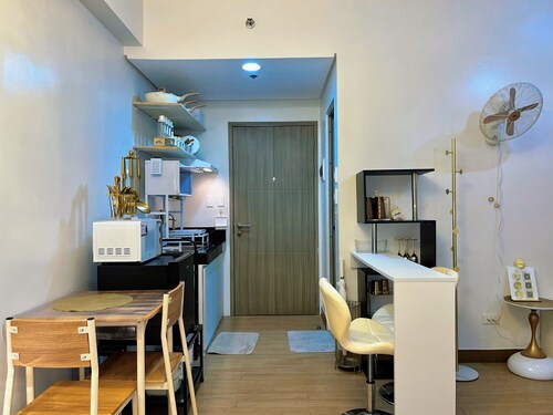 Charming studio type condo in Terrific Trece Martires City with AC
