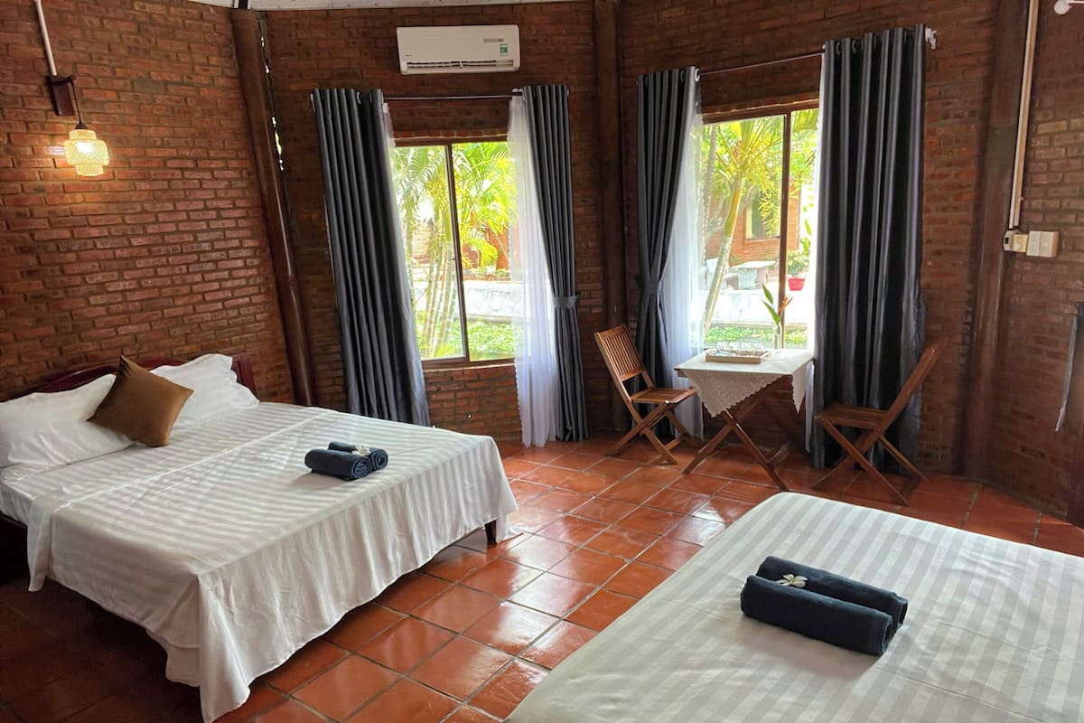 Family Bungalow, 2 Queen Beds, Private Bathroom, Garden View | Desk, blackout drapes, iron/ironing board, free WiFi