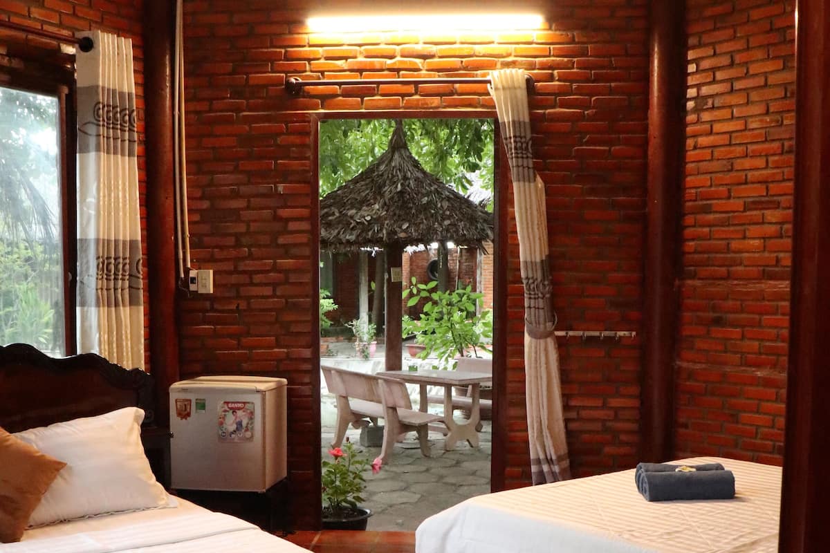 Bungalow, 2 Queen Beds, Patio, Garden View | Desk, blackout drapes, iron/ironing board, free WiFi