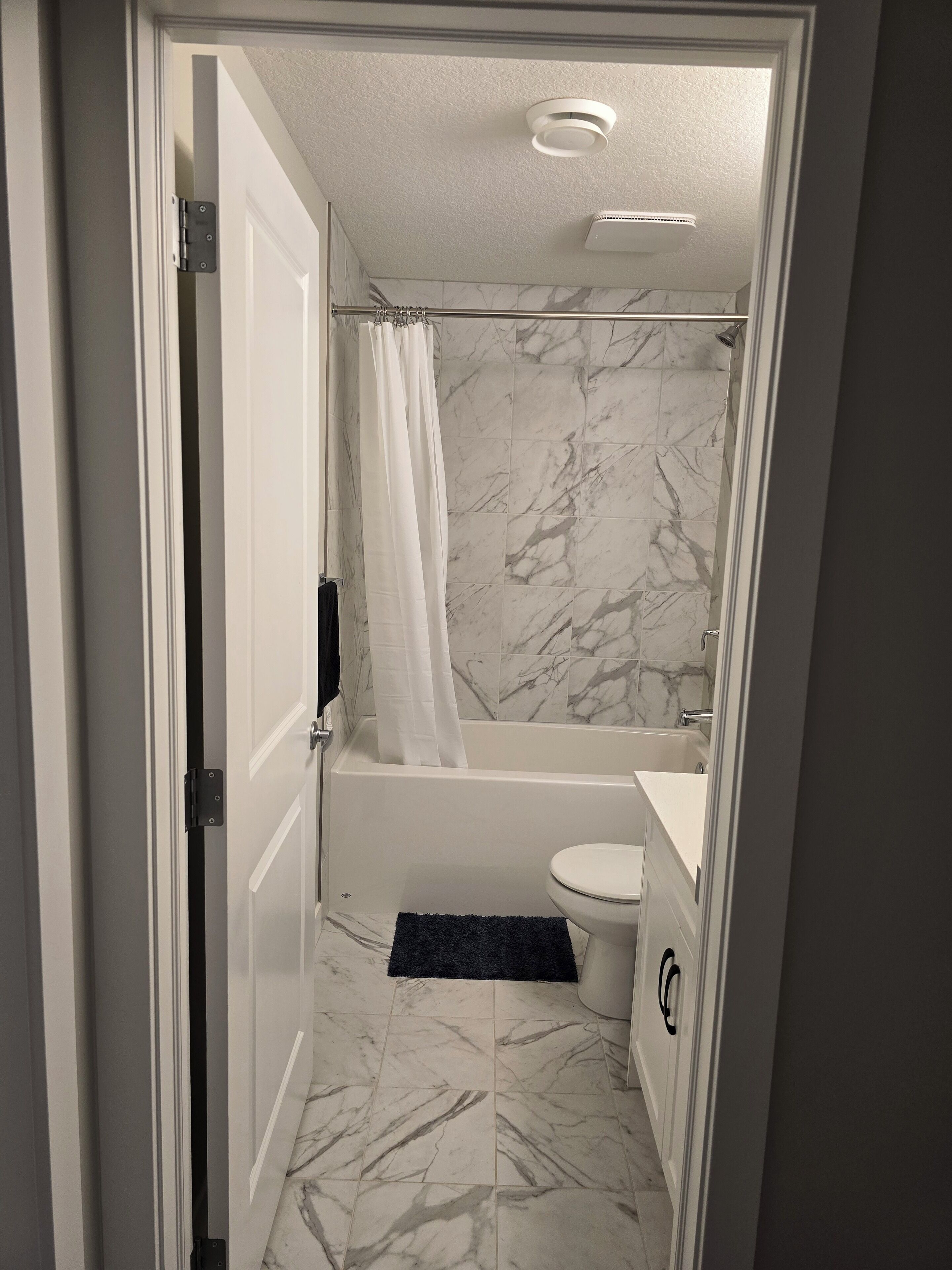 Hair dryer, towels, soap, toilet paper