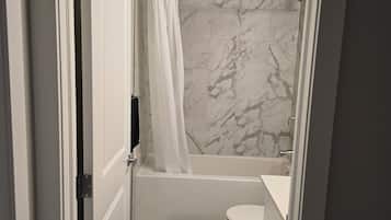 Hair dryer, towels, soap, toilet paper