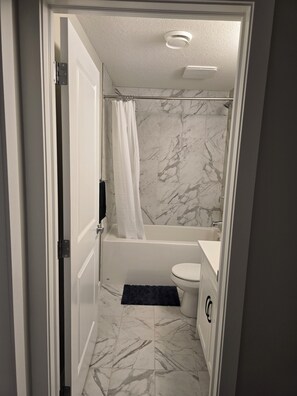 Hair dryer, towels, soap, toilet paper