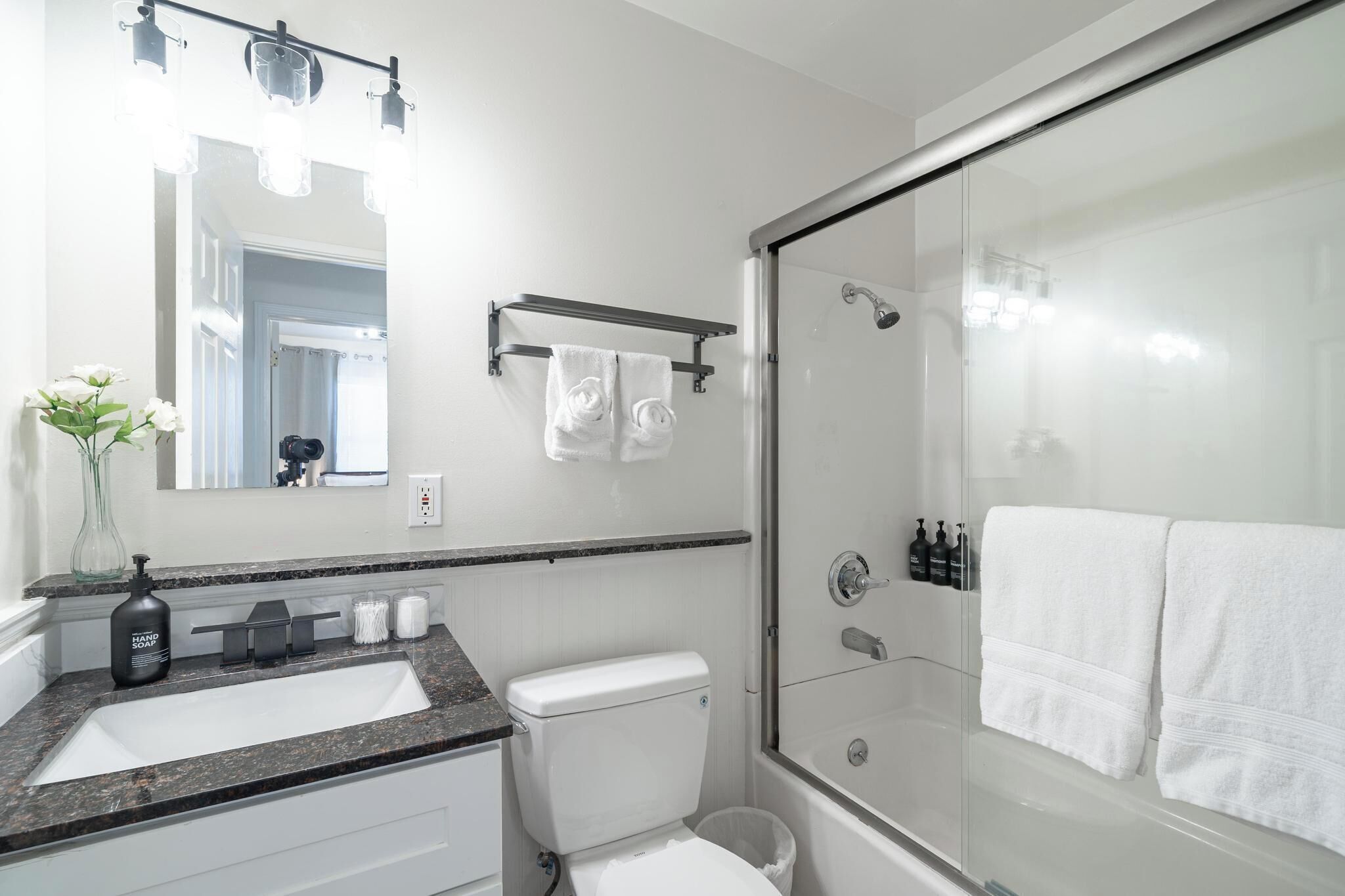 Shower, hair dryer, towels, toilet paper