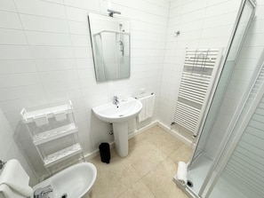 Hair dryer, towels, soap, toilet paper