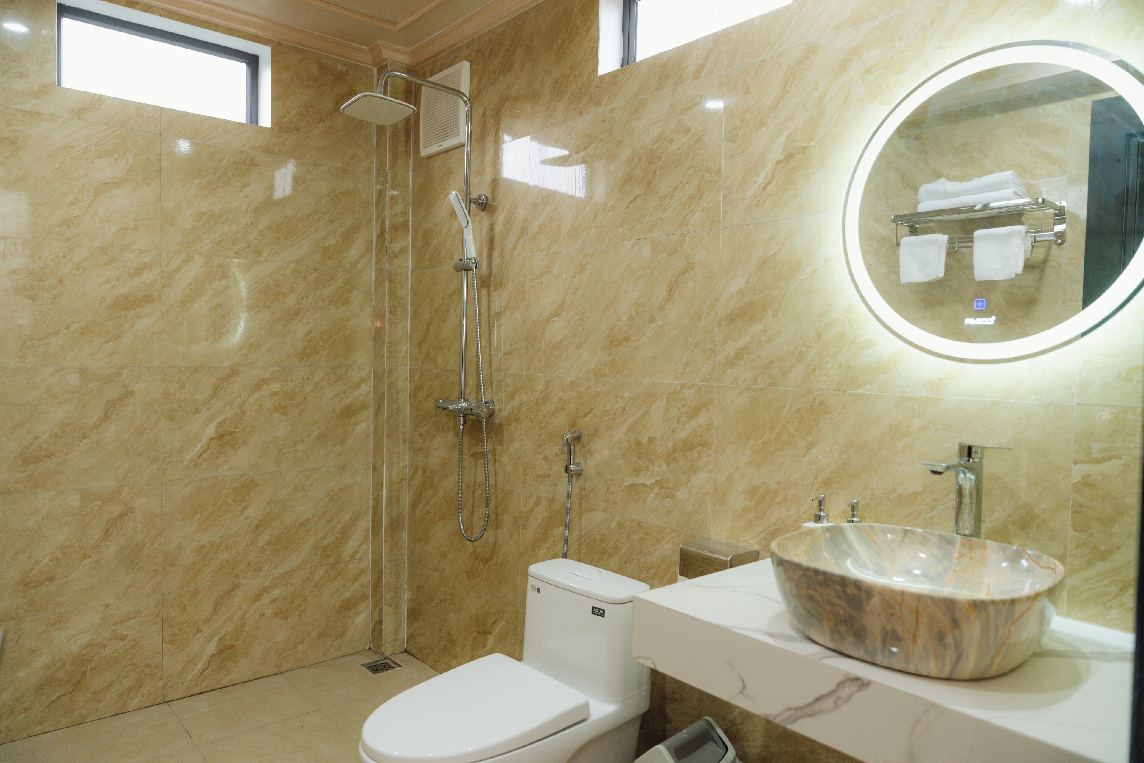 Shower, hair dryer, towels, soap