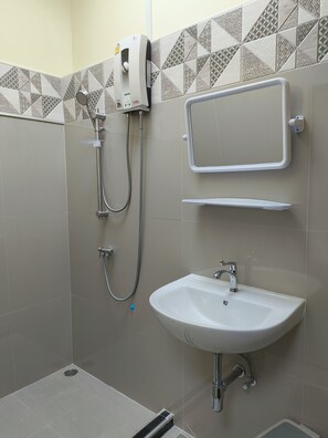 Bidet, towels, soap, toilet paper