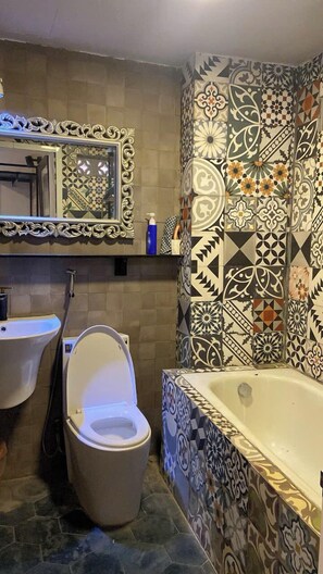 Basic Double Room, Garden View | Bathroom | Shower, hair dryer, towels, soap