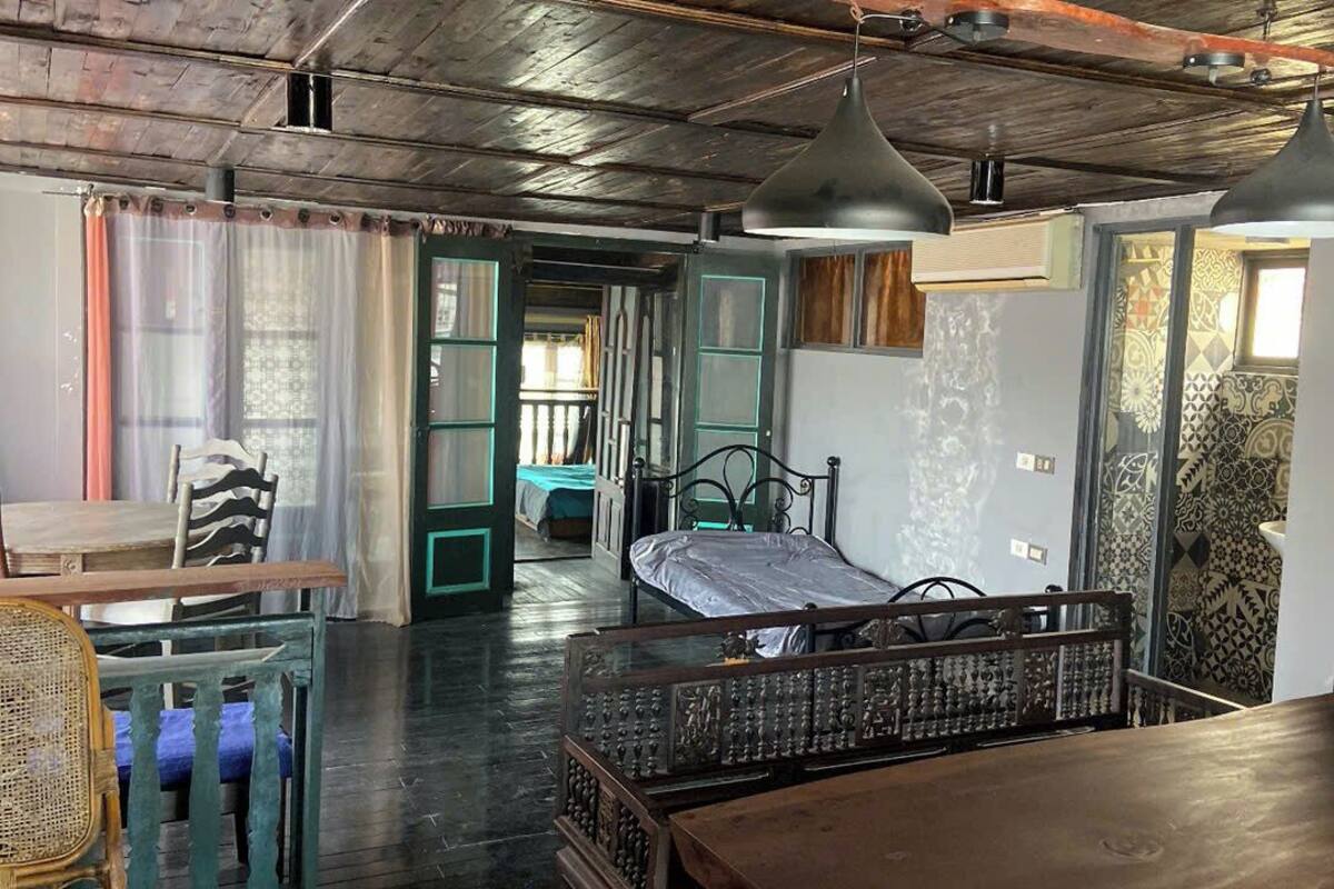 Family Studio Suite, 2 Bedrooms, Balcony, Garden View | Living area