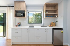 Deluxe-huoneisto, 1 makuuhuone | Työpöytä, kannettavalle tietokoneelle sopiva työtila