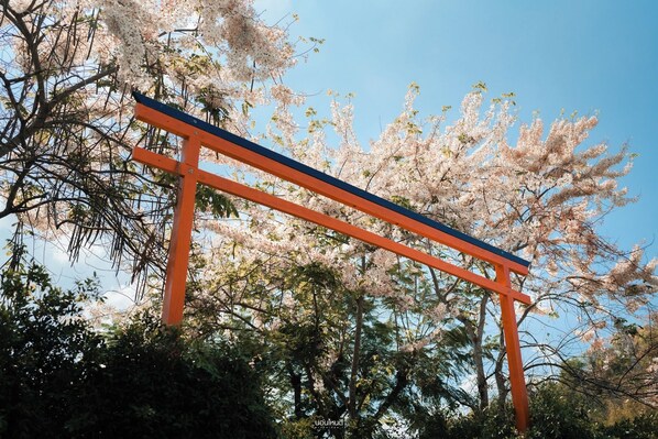 A traditional Japanese torii gate with a clear blue sky in the background. - TheX10 PrivatePoolVilla & ResortKhaoYai (Pak Chong)