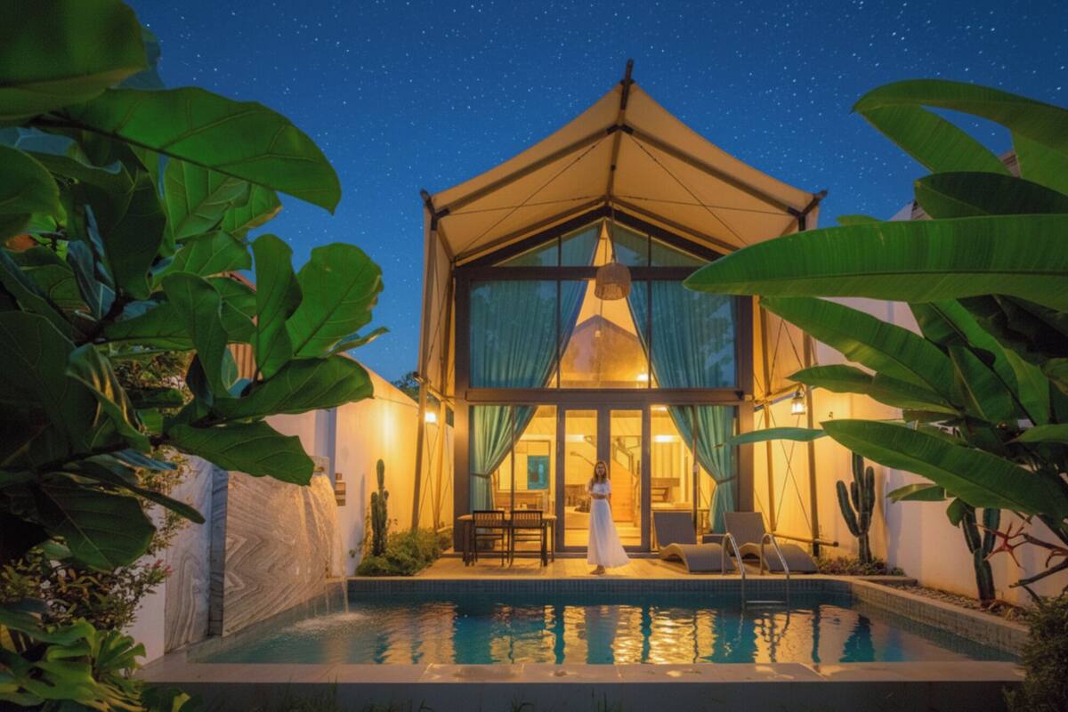 A modern villa with a swimming pool, large windows, and a starry night sky.