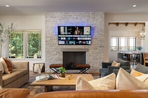 Smart TV, fireplace, books