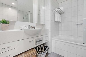 Hair dryer, towels, soap, toilet paper