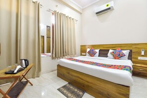 Habitación Deluxe | Sábanas de algodón egipcio, ropa de cama de alta calidad, caja fuerte