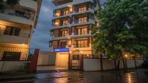 A multi-story hotel with a prominent sign reading "Tab Hotels". - Fabhotel Galaxy Grand (Panvel)