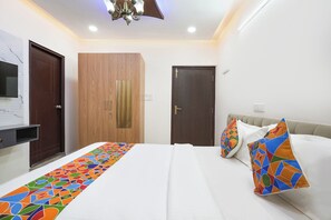 Deluxe kamer | Lakens van Egyptisch katoen, luxe beddengoed, een kluis op de kamer