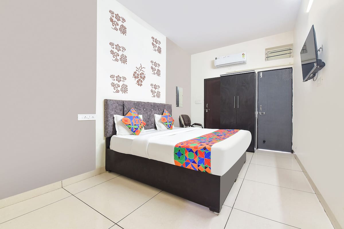 Habitación Deluxe | Sábanas de algodón egipcio, ropa de cama de alta calidad y wifi gratis 