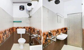 Deluxe Room | Bathroom | Shower, rainfall showerhead, free toiletries, towels