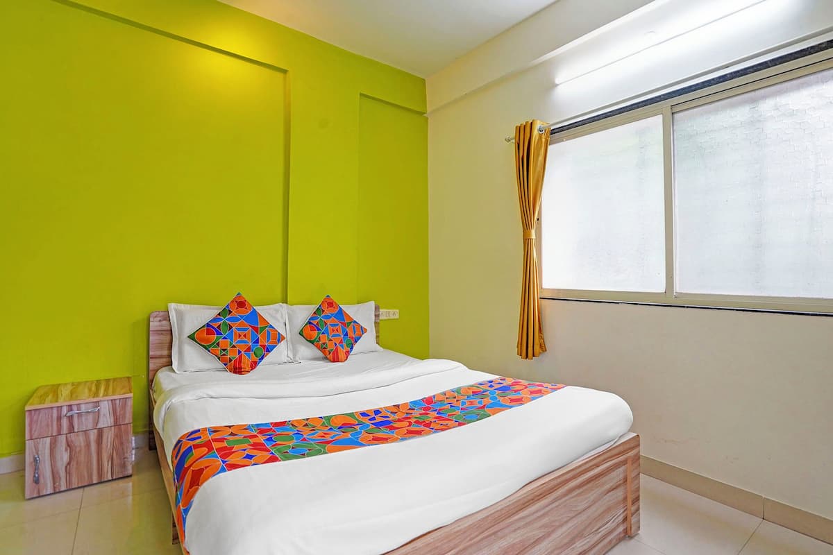 ห้องดีลักซ์ | ผ้าปูที่นอนฝ้ายอียิปต์, เครื่องนอนระดับพรีเมียม, ตู้นิรภัยในห้องพัก