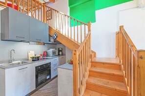 Apartemen Keluarga, beberapa kamar (Nido dell'Usignolo) | Dapur pribadi | Lemari es, microwave, kompor, dan mesin pembuat kopi/teh