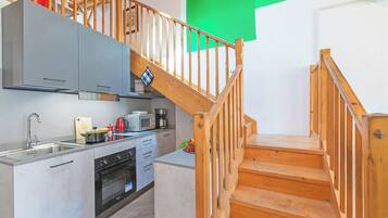 Family Apartment, 2 Bedrooms (Nido dell'Usignolo) | Private kitchen | Fridge, microwave, stovetop, coffee/tea maker