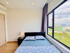 Desk, iron/ironing board, free WiFi, bed sheets - TPHomes New City (Ho Chi Minh City)