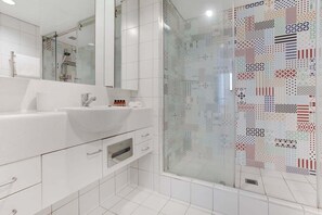 Hair dryer, towels, soap, shampoo