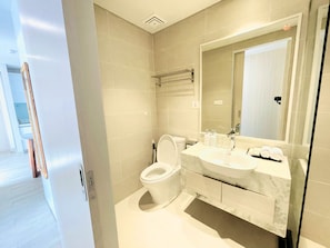 Hair dryer, slippers, towels, soap