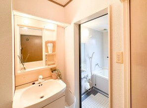 Hair dryer, towels, soap, toilet paper