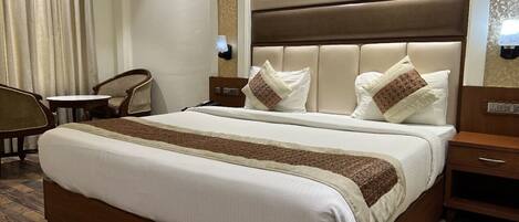 Deluxe Double Room, City View | Premium bedding, desk, laptop workspace, blackout curtains