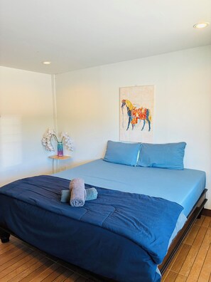 Family Triple Room, Garden View | Desk, laptop workspace, free WiFi