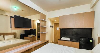 Quintessa Room at Candiland Apartement