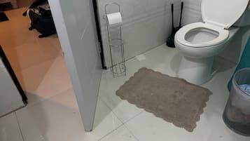 Bidet, towels, soap, shampoo